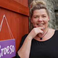 About Us: Ali, founder of Needle Rock, professionally trained in upholstery, passionate about rescuing furniture and creative design.