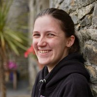 About Us: Rosie, Needle Rock's lead machinist and skilled upholsterer, known for her expertise in sewing and her creative spirit.