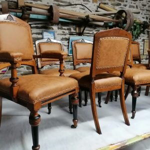 Set of 8 traditionally upholstered dining chairs.